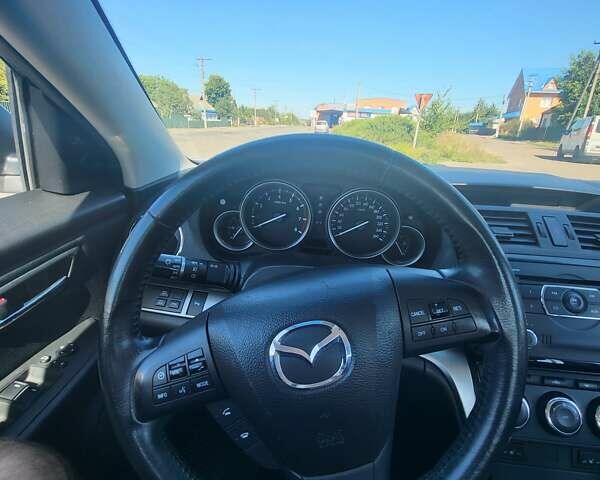 Серый Мазда 6, объемом двигателя 2 л и пробегом 106 тыс. км за 9500 $, фото 1 на Automoto.ua