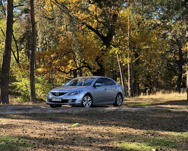 Серый Мазда 6, объемом двигателя 2 л и пробегом 106 тыс. км за 10000 $, фото 1 на Automoto.ua