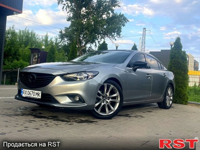 Серый Мазда 6, объемом двигателя 2.5 л и пробегом 200 тыс. км за 13000 $, фото 1 на Automoto.ua