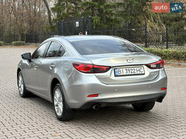 Серый Мазда 6, объемом двигателя 2.18 л и пробегом 227 тыс. км за 11250 $, фото 7 на Automoto.ua