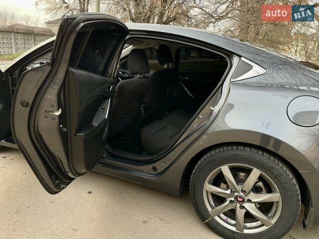 Серый Мазда 6, объемом двигателя 2.19 л и пробегом 302 тыс. км за 10000 $, фото 12 на Automoto.ua