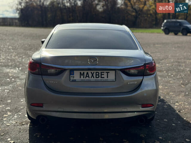 Серый Мазда 6, объемом двигателя 2.49 л и пробегом 240 тыс. км за 9799 $, фото 3 на Automoto.ua
