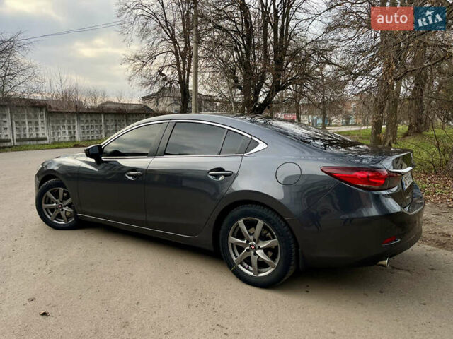 Серый Мазда 6, объемом двигателя 2.19 л и пробегом 302 тыс. км за 10000 $, фото 2 на Automoto.ua