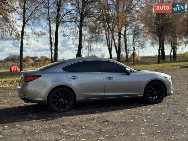 Серый Мазда 6, объемом двигателя 2.49 л и пробегом 240 тыс. км за 9799 $, фото 5 на Automoto.ua