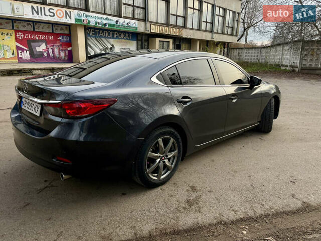 Серый Мазда 6, объемом двигателя 2.19 л и пробегом 302 тыс. км за 10000 $, фото 15 на Automoto.ua