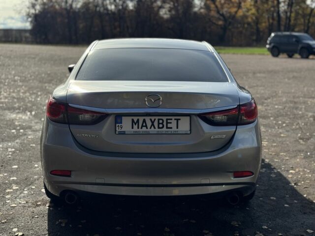 Серый Мазда 6, объемом двигателя 2.5 л и пробегом 240 тыс. км за 9799 $, фото 5 на Automoto.ua