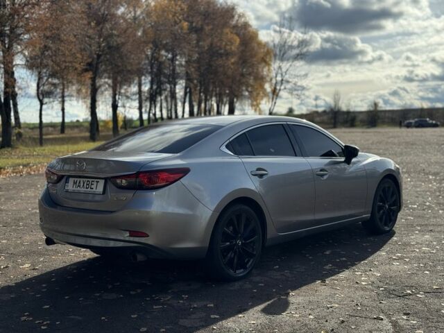 Серый Мазда 6, объемом двигателя 2.5 л и пробегом 240 тыс. км за 9799 $, фото 4 на Automoto.ua