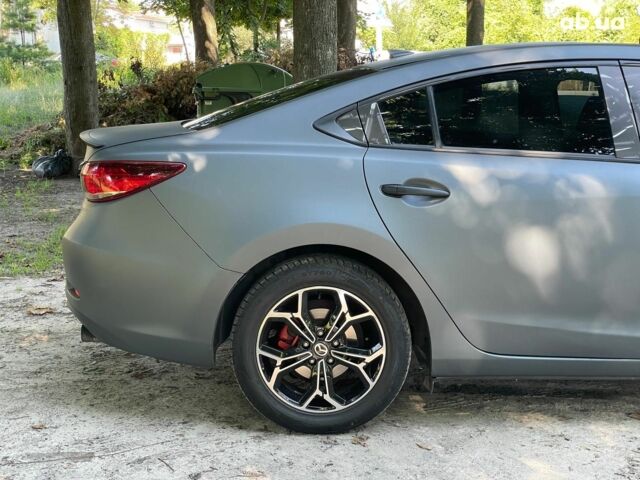 Серый Мазда 6, объемом двигателя 2.5 л и пробегом 256 тыс. км за 10490 $, фото 10 на Automoto.ua