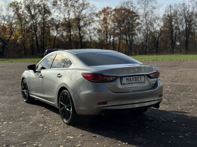 Серый Мазда 6, объемом двигателя 2.5 л и пробегом 240 тыс. км за 9799 $, фото 3 на Automoto.ua