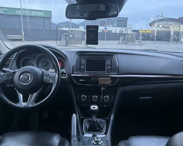 Серый Мазда 6, объемом двигателя 2.18 л и пробегом 287 тыс. км за 11300 $, фото 14 на Automoto.ua