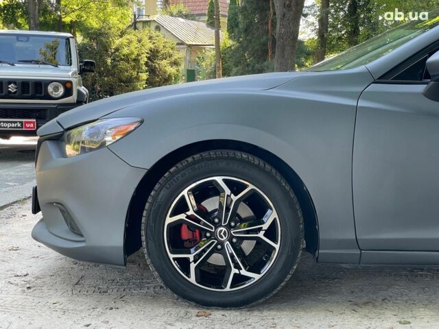 Серый Мазда 6, объемом двигателя 2.5 л и пробегом 256 тыс. км за 10490 $, фото 4 на Automoto.ua