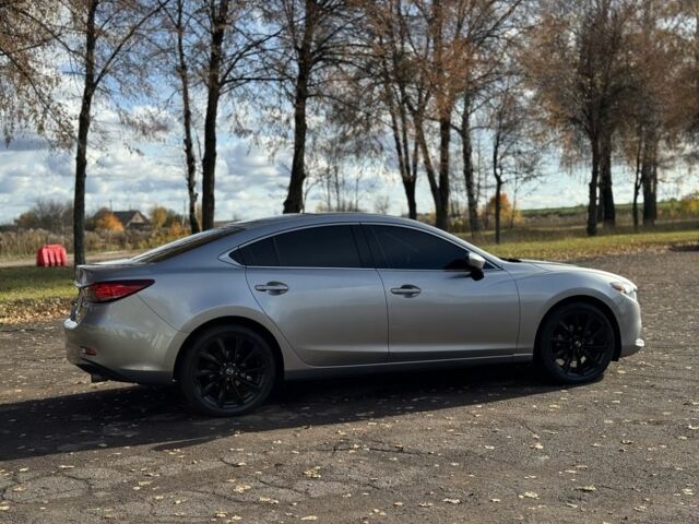 Серый Мазда 6, объемом двигателя 2.5 л и пробегом 240 тыс. км за 9799 $, фото 6 на Automoto.ua