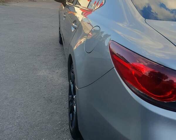 Сірий Мазда 6, об'ємом двигуна 2.49 л та пробігом 340 тис. км за 9800 $, фото 4 на Automoto.ua