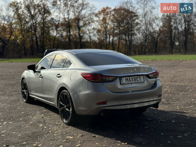 Серый Мазда 6, объемом двигателя 2.49 л и пробегом 240 тыс. км за 9799 $, фото 2 на Automoto.ua