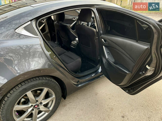 Серый Мазда 6, объемом двигателя 2.19 л и пробегом 302 тыс. км за 10000 $, фото 17 на Automoto.ua