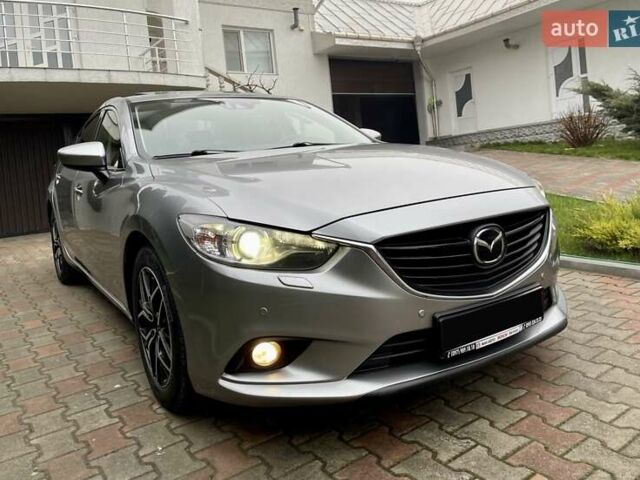 Серый Мазда 6, объемом двигателя 2.18 л и пробегом 209 тыс. км за 10850 $, фото 9 на Automoto.ua