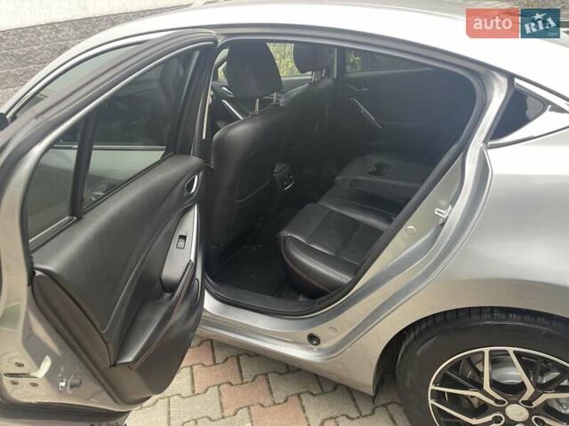 Сірий Мазда 6, об'ємом двигуна 2.19 л та пробігом 209 тис. км за 11000 $, фото 5 на Automoto.ua