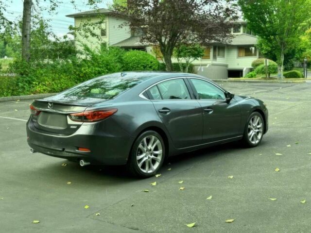 Серый Мазда 6, объемом двигателя 2.5 л и пробегом 80 тыс. км за 11000 $, фото 6 на Automoto.ua