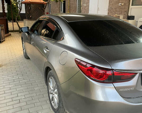 Сірий Мазда 6, об'ємом двигуна 2 л та пробігом 247 тис. км за 10500 $, фото 3 на Automoto.ua