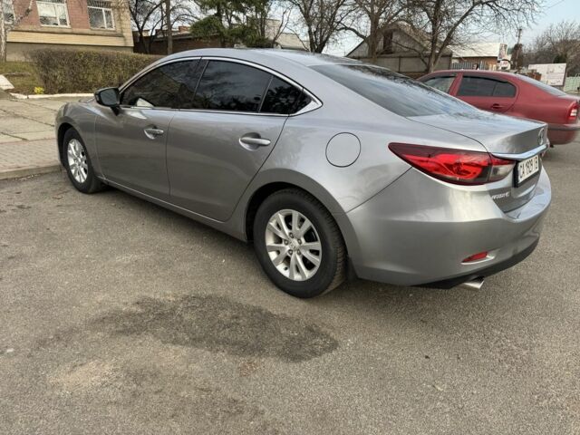 Серый Мазда 6, объемом двигателя 2.5 л и пробегом 210 тыс. км за 8999 $, фото 5 на Automoto.ua