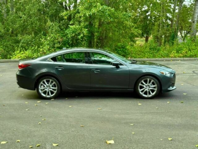 Серый Мазда 6, объемом двигателя 2.5 л и пробегом 80 тыс. км за 11000 $, фото 7 на Automoto.ua