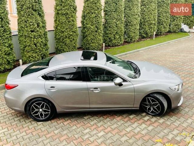 Сірий Мазда 6, об'ємом двигуна 2.19 л та пробігом 209 тис. км за 11000 $, фото 7 на Automoto.ua