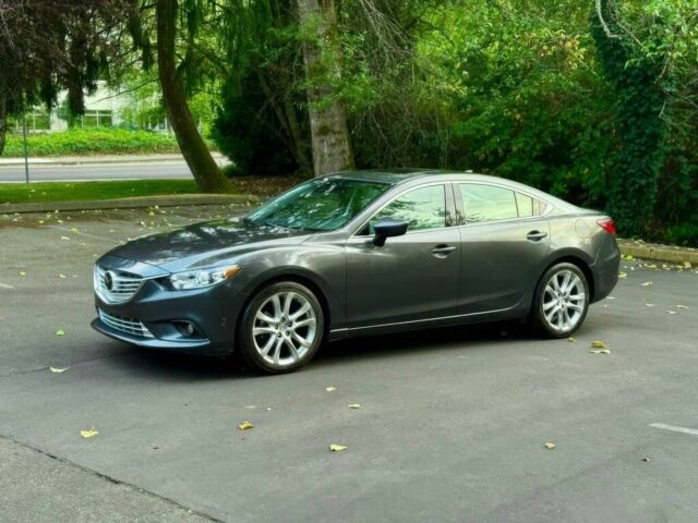 Серый Мазда 6, объемом двигателя 2.5 л и пробегом 80 тыс. км за 11000 $, фото 3 на Automoto.ua