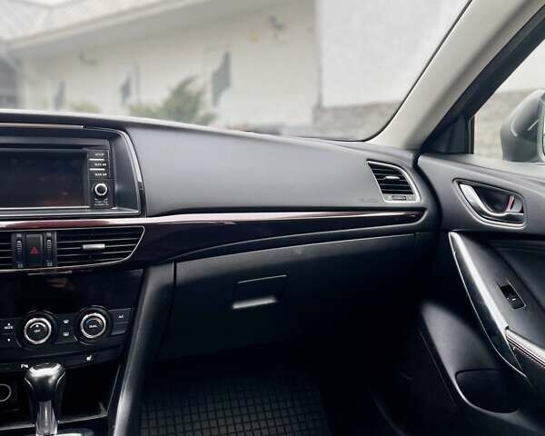 Сірий Мазда 6, об'ємом двигуна 2.19 л та пробігом 209 тис. км за 11000 $, фото 16 на Automoto.ua