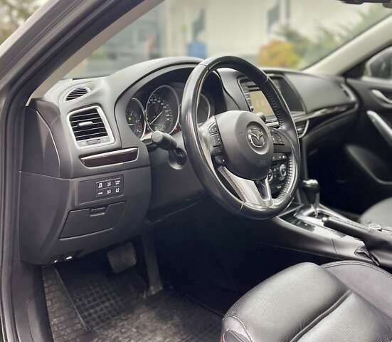 Сірий Мазда 6, об'ємом двигуна 2.19 л та пробігом 209 тис. км за 11000 $, фото 10 на Automoto.ua
