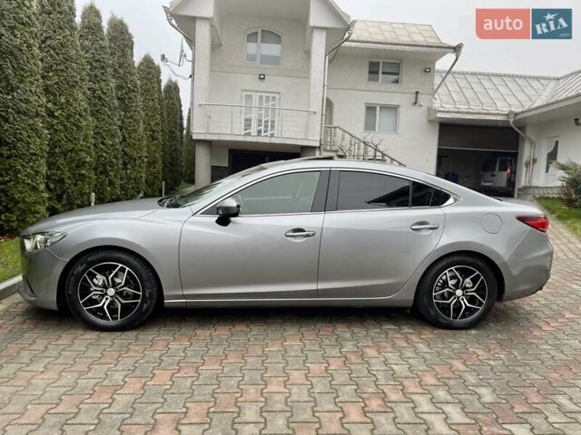 Серый Мазда 6, объемом двигателя 2.18 л и пробегом 209 тыс. км за 10850 $, фото 12 на Automoto.ua