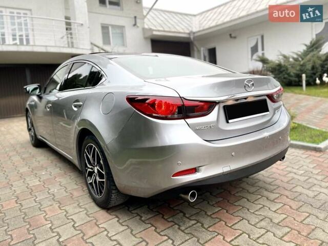 Серый Мазда 6, объемом двигателя 2.18 л и пробегом 209 тыс. км за 10850 $, фото 13 на Automoto.ua