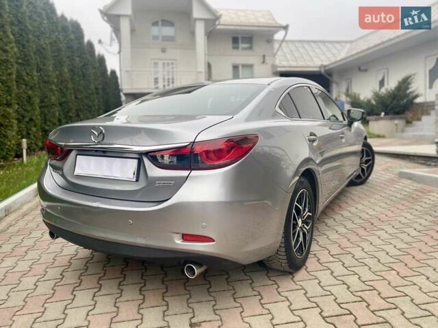 Сірий Мазда 6, об'ємом двигуна 2.19 л та пробігом 209 тис. км за 11000 $, фото 36 на Automoto.ua