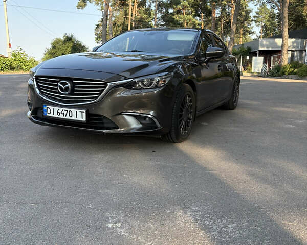 Серый Мазда 6, объемом двигателя 2.19 л и пробегом 167 тыс. км за 14499 $, фото 3 на Automoto.ua