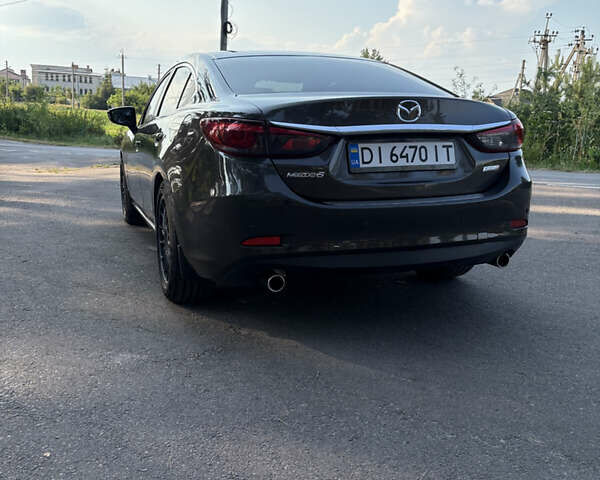 Серый Мазда 6, объемом двигателя 2.19 л и пробегом 167 тыс. км за 14499 $, фото 17 на Automoto.ua