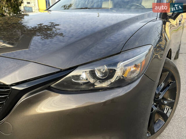 Серый Мазда 6, объемом двигателя 2.49 л и пробегом 97 тыс. км за 14500 $, фото 4 на Automoto.ua