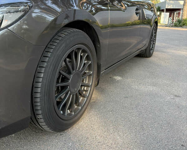 Серый Мазда 6, объемом двигателя 2.19 л и пробегом 167 тыс. км за 14499 $, фото 7 на Automoto.ua