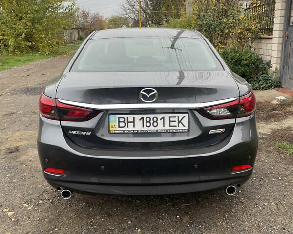 Серый Мазда 6, объемом двигателя 2.19 л и пробегом 110 тыс. км за 13500 $, фото 9 на Automoto.ua