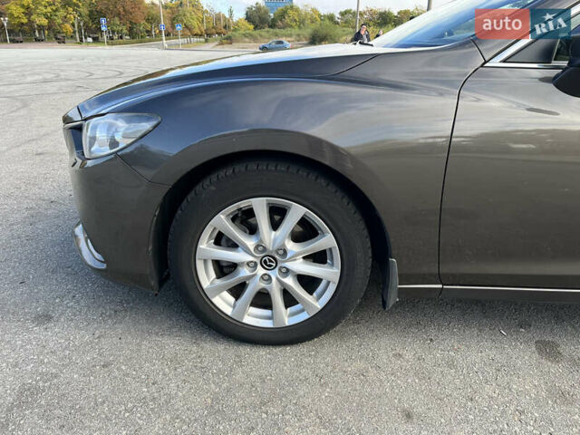 Серый Мазда 6, объемом двигателя 2 л и пробегом 160 тыс. км за 13500 $, фото 3 на Automoto.ua