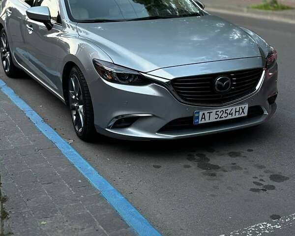Серый Мазда 6, объемом двигателя 2.49 л и пробегом 155 тыс. км за 15800 $, фото 1 на Automoto.ua