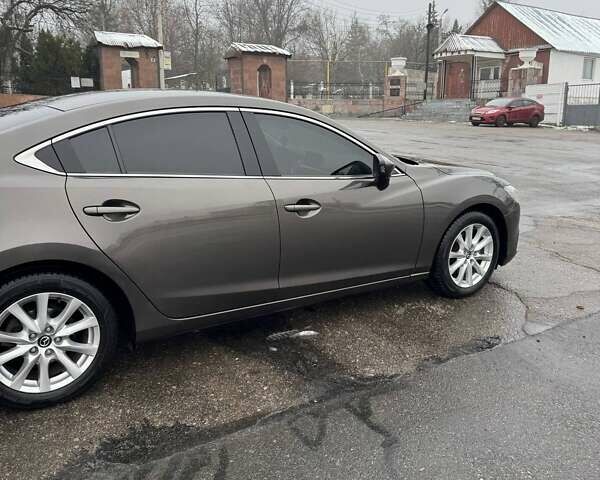 Серый Мазда 6, объемом двигателя 2.49 л и пробегом 157 тыс. км за 12800 $, фото 9 на Automoto.ua