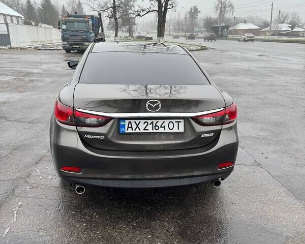 Серый Мазда 6, объемом двигателя 2.49 л и пробегом 157 тыс. км за 12800 $, фото 5 на Automoto.ua