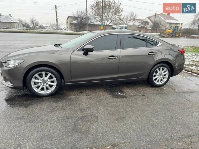 Серый Мазда 6, объемом двигателя 2.49 л и пробегом 157 тыс. км за 12800 $, фото 4 на Automoto.ua