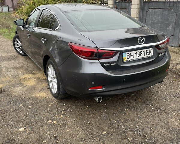 Серый Мазда 6, объемом двигателя 2.19 л и пробегом 110 тыс. км за 13500 $, фото 5 на Automoto.ua