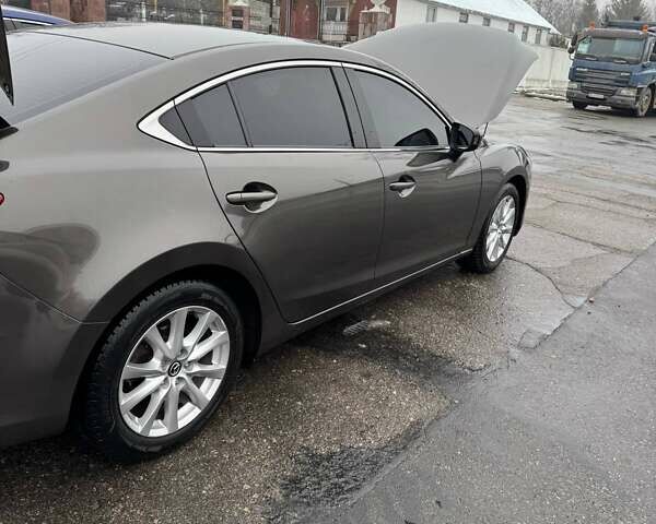 Серый Мазда 6, объемом двигателя 2.49 л и пробегом 157 тыс. км за 12800 $, фото 6 на Automoto.ua