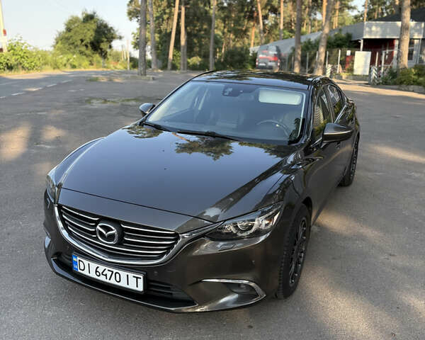 Серый Мазда 6, объемом двигателя 2.19 л и пробегом 167 тыс. км за 14499 $, фото 5 на Automoto.ua