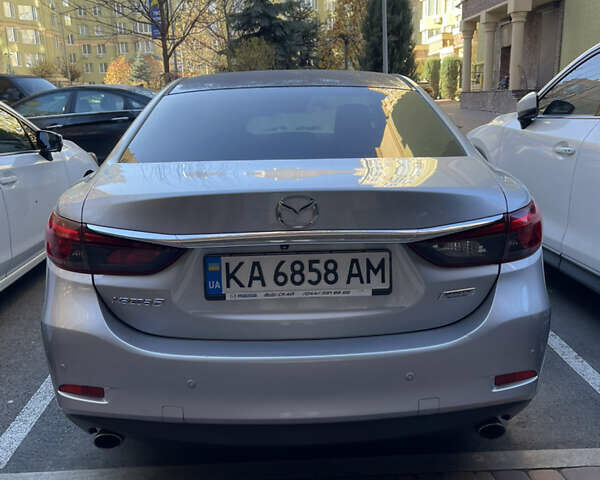 Серый Мазда 6, объемом двигателя 2.49 л и пробегом 142 тыс. км за 14500 $, фото 5 на Automoto.ua