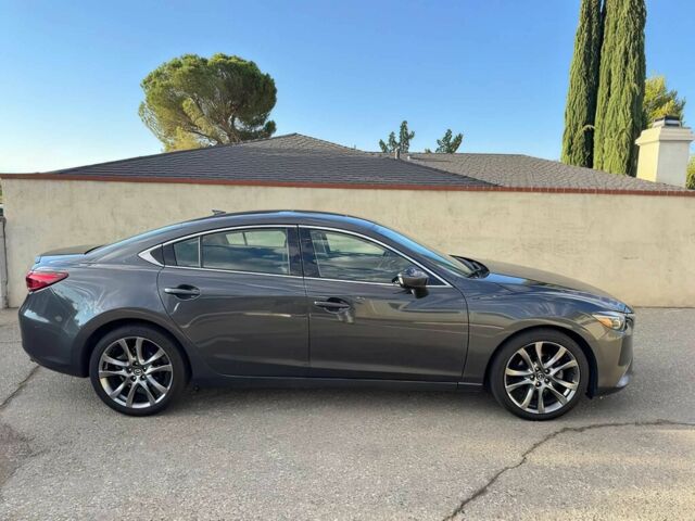 Сірий Мазда 6, об'ємом двигуна 2.5 л та пробігом 76 тис. км за 9900 $, фото 2 на Automoto.ua