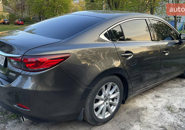 Серый Мазда 6, объемом двигателя 2.49 л и пробегом 170 тыс. км за 12500 $, фото 5 на Automoto.ua