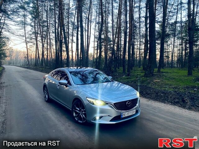 Сірий Мазда 6, об'ємом двигуна 2.5 л та пробігом 209 тис. км за 11800 $, фото 4 на Automoto.ua
