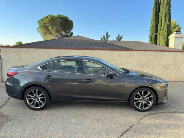 Серый Мазда 6, объемом двигателя 2.5 л и пробегом 76 тыс. км за 6300 $, фото 4 на Automoto.ua